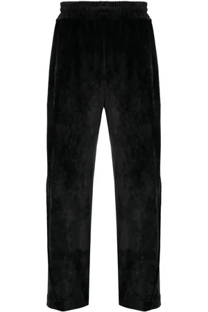 GCDS Logo-embroidered velvet trousers