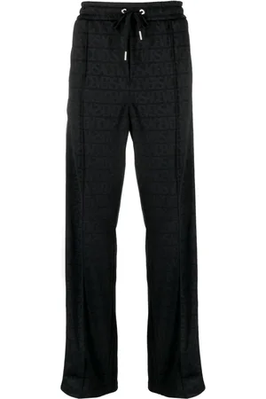 VERSACE Allover pattern track pants
