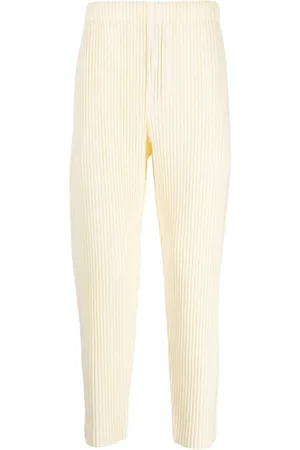 HOMME PLISSÉ ISSEY MIYAKE: Off-White Kersey Pleats Trousers