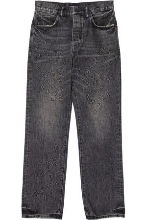 Purple Brand Monogram-embossed jeans