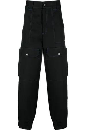 Msgm Contrasting-stitch logo-patch trousers