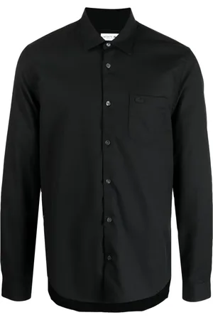 Camiseta negra online lacoste