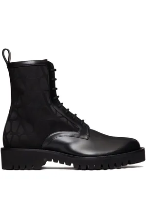 VALENTINO GARAVANI Toile Iconographe leather combat boots