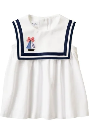 Familiar Motif-embroidered cotton blouse