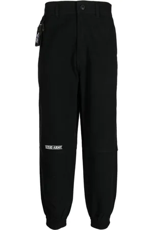 Izzue Logo-print tapered-leg trousers