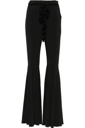 ROTATE Ruffle-detailing high-waist flared trousers