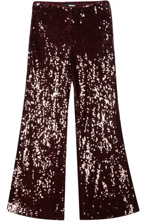 ROTATE High-waisted flared sequinned trousers