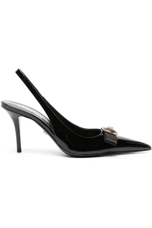 Gianni bow-detail leather pumps in white - Versace