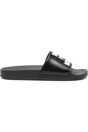 Moschino Slogan-embossed strap slides