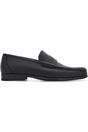 Salvatore Ferragamo Logo-debossed leather loafers