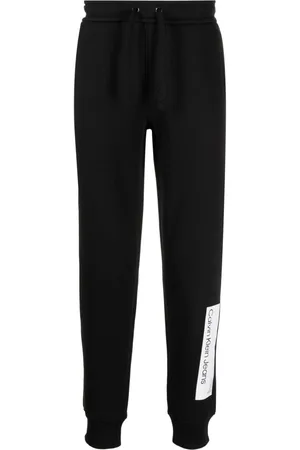 Buy Calvin Klein Jeans Women Relaxed Fit Solid Joggers - Track Pants for  Women 21199460 | Myntra