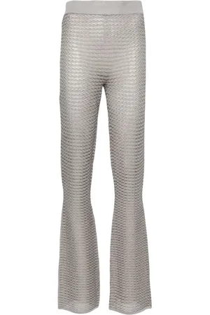 REMAIN Metallic striped flared trousers