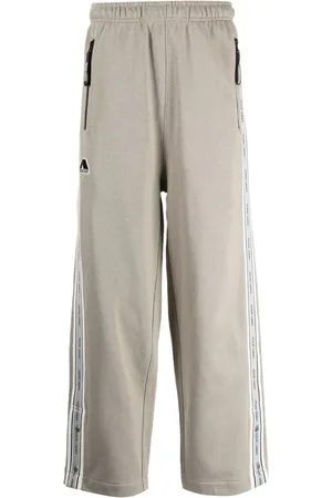Izzue Logo-patch cotton-blend track pants