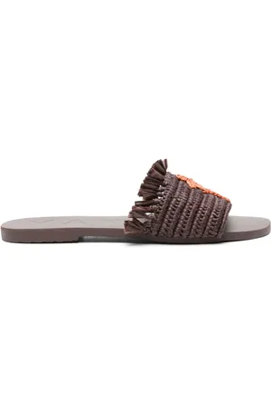 MANEBI Fringed raffia slides