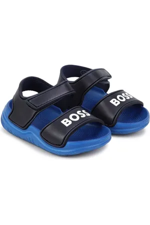 Shop Hugo Boss Unisex Street Style Flipflop Logo Sandals by epimano | BUYMA