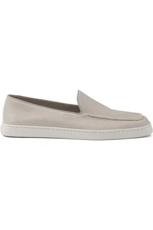 Prada Piped-trim leather loafers