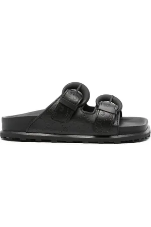 Marine Serre Monogram-embossed leather slides