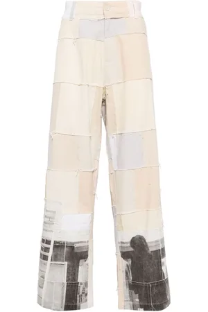KIDSUPER STUDIOS Graphic-print panelled design trousers