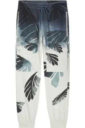 DRIES VAN NOTEN Palm-printed trousers