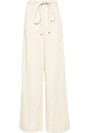Totême Belted-waist flared trousers