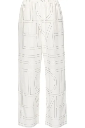 Totême Embroidered-monogram trousers