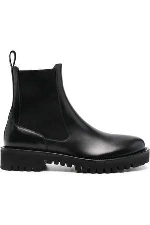 VALENTINO GARAVANI Toile Iconographe leather boots