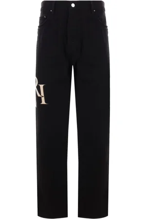 AMIRI Staggered Logo Jeans