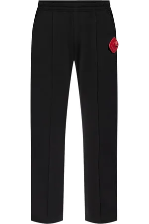 Moschino Logo-appliqué cotton track pants