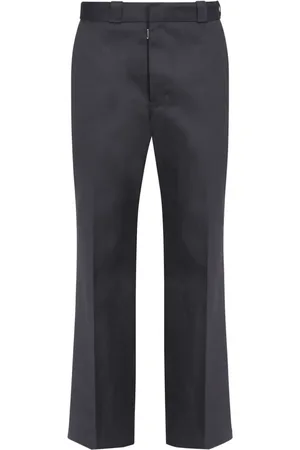 Maison Margiela Pleated pressed-crease trousers