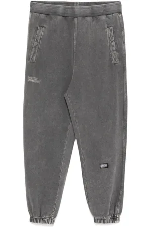 Izzue Logo-embroidered pants