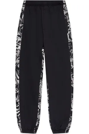 VERSACE Floral-panelled trousers