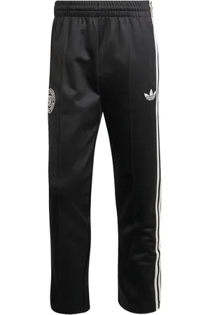 adidas Three-stripe embroidered track pants