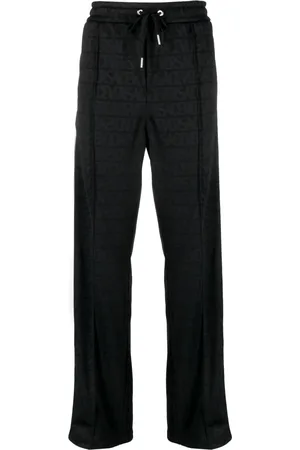 VERSACE Allover pattern track pants