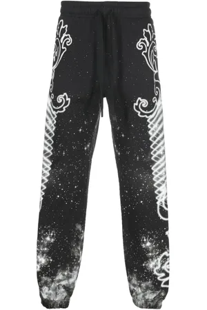 VERSACE Galaxy-print cotton track-pants