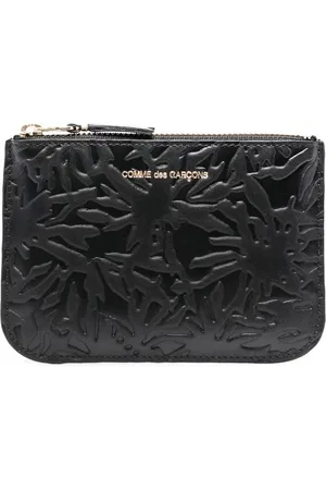 Comme des Garçons Embossed leather wallet