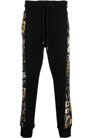 VERSACE Logo print track pants
