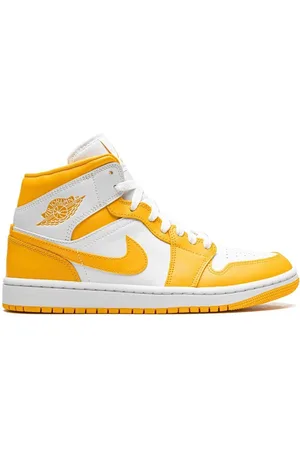 Jordan 1 Mid "White/University Gold" sneakers