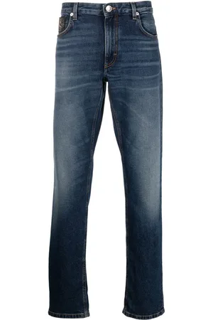 Roberto Cavalli Faded-finish slim-cut jeans