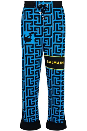 Balmain monogram-print Track Pants - Blue