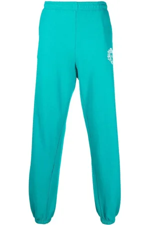 Sporty & Rich Crest logo print track pants