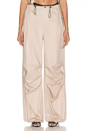 Mid-rise leather pants in beige - The Mannei