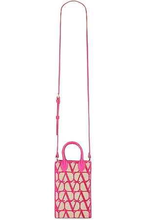 Givenchy Mini Antigona Lock bag in laminated pink VS Versace La