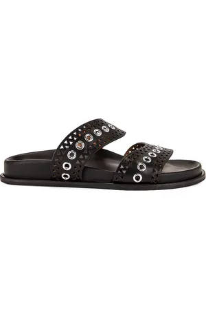 Alaïa Perforated Eyelet Slides in Black