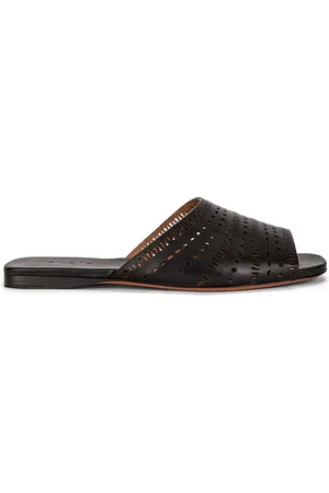 Alaïa Vienne Leather Slides in Black