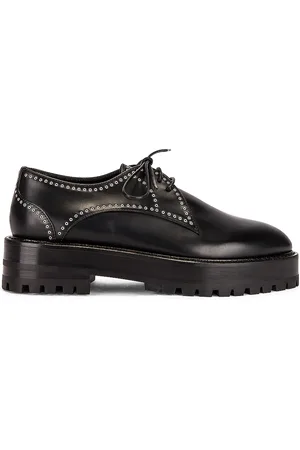 Alaïa Eyelet Derby Loafers in Black