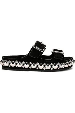Alaïa Bombe Mules in Black