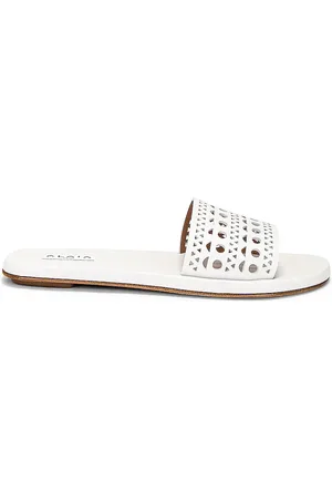 Alaïa Perforated Flat Sandal in White