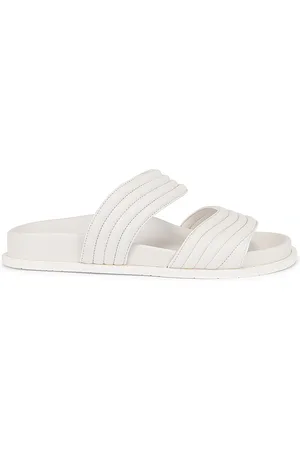Alaïa Leather Slides in White