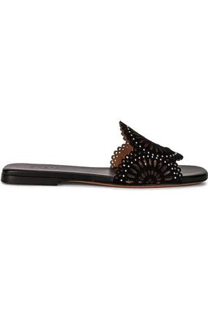 Alaïa Perforated Molukai Mules in Black