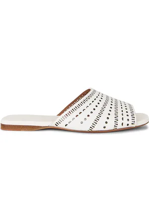 Alaïa Vienne Leather Slides in White